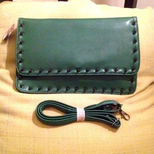 Green faux leather with black spike details